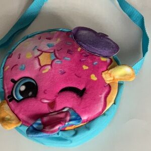 Shopkins donut, purse, velvety, and canvas turquoise back with adjustable strap.